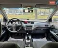 Сірий Міцубісі Lancer, об'ємом двигуна 1.58 л та пробігом 138 тис. км за 4990 $, фото 20 на Automoto.ua