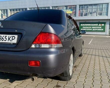 Серый Мицубиси Лансер, объемом двигателя 1.6 л и пробегом 260 тыс. км за 3950 $, фото 10 на Automoto.ua