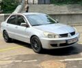 Серый Мицубиси Лансер, объемом двигателя 1.6 л и пробегом 216 тыс. км за 5100 $, фото 1 на Automoto.ua