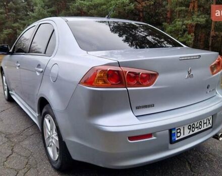 Серый Мицубиси Лансер, объемом двигателя 2 л и пробегом 213 тыс. км за 6550 $, фото 9 на Automoto.ua