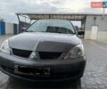 Сірий Міцубісі Lancer, об'ємом двигуна 1.6 л та пробігом 330 тис. км за 3500 $, фото 24 на Automoto.ua