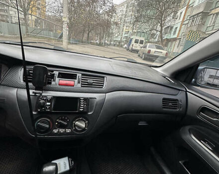 Серый Мицубиси Лансер, объемом двигателя 1.6 л и пробегом 238 тыс. км за 4400 $, фото 12 на Automoto.ua