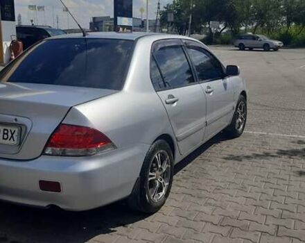 Серый Мицубиси Лансер, объемом двигателя 1.6 л и пробегом 420 тыс. км за 4900 $, фото 8 на Automoto.ua