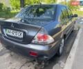 Сірий Міцубісі Lancer, об'ємом двигуна 1.6 л та пробігом 280 тис. км за 2600 $, фото 1 на Automoto.ua