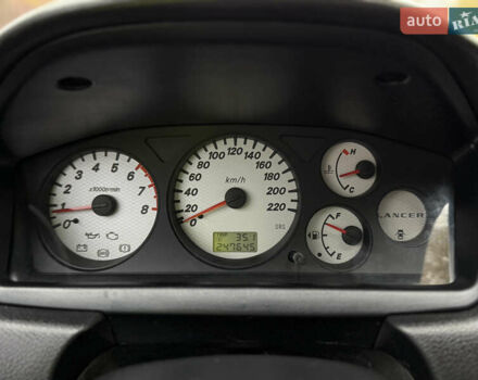 Сірий Міцубісі Lancer, об'ємом двигуна 1.58 л та пробігом 247 тис. км за 4900 $, фото 22 на Automoto.ua