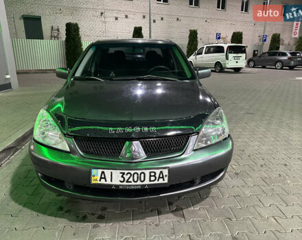 Серый Мицубиси Лансер, объемом двигателя 1.6 л и пробегом 112 тыс. км за 2800 $, фото 11 на Automoto.ua