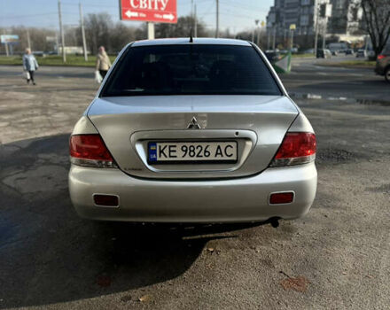 Сірий Міцубісі Lancer, об'ємом двигуна 1.6 л та пробігом 249 тис. км за 5100 $, фото 3 на Automoto.ua