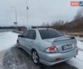 Серый Мицубиси Лансер, объемом двигателя 2 л и пробегом 253 тыс. км за 4200 $, фото 3 на Automoto.ua