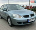 Сірий Міцубісі Lancer, об'ємом двигуна 1.6 л та пробігом 116 тис. км за 5199 $, фото 1 на Automoto.ua