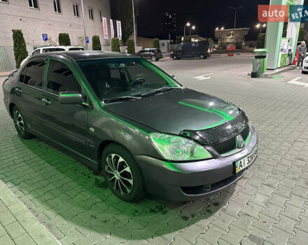 Серый Мицубиси Лансер, объемом двигателя 1.6 л и пробегом 112 тыс. км за 2800 $, фото 10 на Automoto.ua