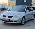 Сірий Міцубісі Lancer, об'ємом двигуна 1.6 л та пробігом 198 тис. км за 4697 $, фото 1 на Automoto.ua
