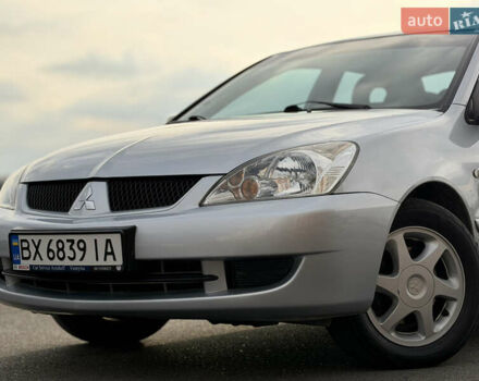 Серый Мицубиси Лансер, объемом двигателя 1.3 л и пробегом 160 тыс. км за 5555 $, фото 27 на Automoto.ua