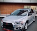 Серый Мицубиси Лансер, объемом двигателя 2 л и пробегом 250 тыс. км за 7000 $, фото 1 на Automoto.ua