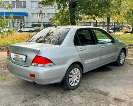Серый Мицубиси Лансер, объемом двигателя 1.6 л и пробегом 138 тыс. км за 4490 $, фото 8 на Automoto.ua