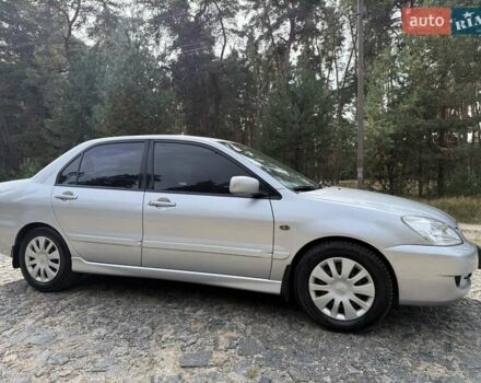 Серый Мицубиси Лансер, объемом двигателя 1.6 л и пробегом 200 тыс. км за 4400 $, фото 4 на Automoto.ua