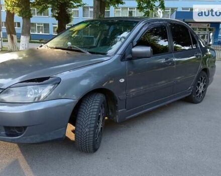 Сірий Міцубісі Lancer, об'ємом двигуна 1.6 л та пробігом 230 тис. км за 3950 $, фото 7 на Automoto.ua