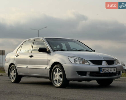 Серый Мицубиси Лансер, объемом двигателя 1.3 л и пробегом 160 тыс. км за 5555 $, фото 3 на Automoto.ua