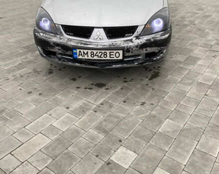 Серый Мицубиси Лансер, объемом двигателя 1.6 л и пробегом 263 тыс. км за 2350 $, фото 2 на Automoto.ua