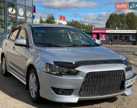 Серый Мицубиси Лансер, объемом двигателя 2 л и пробегом 150 тыс. км за 6100 $, фото 6 на Automoto.ua