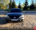 Серый Мицубиси Лансер, объемом двигателя 2 л и пробегом 432 тыс. км за 3400 $, фото 1 на Automoto.ua