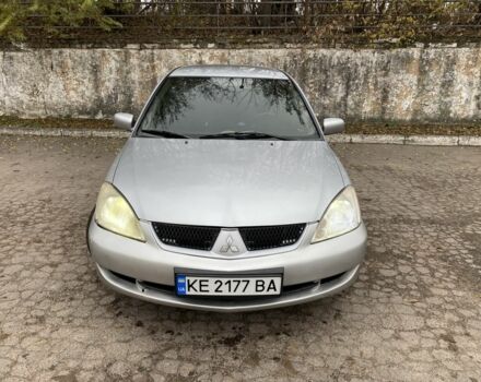 Серый Мицубиси Лансер, объемом двигателя 1.6 л и пробегом 380 тыс. км за 4000 $, фото 4 на Automoto.ua