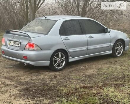 Сірий Міцубісі Lancer, об'ємом двигуна 2 л та пробігом 234 тис. км за 6000 $, фото 1 на Automoto.ua