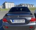 Сірий Міцубісі Lancer, об'ємом двигуна 1.6 л та пробігом 293 тис. км за 5000 $, фото 3 на Automoto.ua
