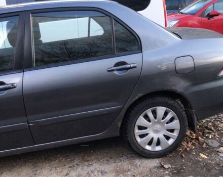 Серый Мицубиси Лансер, объемом двигателя 1.5 л и пробегом 269 тыс. км за 4200 $, фото 21 на Automoto.ua