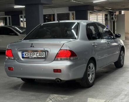 Серый Мицубиси Лансер, объемом двигателя 1.58 л и пробегом 271 тыс. км за 4200 $, фото 11 на Automoto.ua