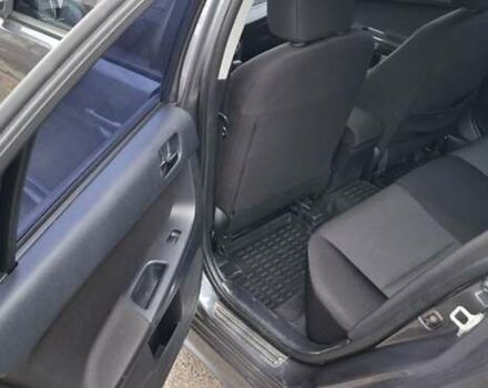 Серый Мицубиси Лансер, объемом двигателя 2 л и пробегом 189 тыс. км за 6800 $, фото 10 на Automoto.ua