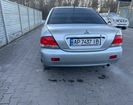 Серый Мицубиси Лансер, объемом двигателя 1.6 л и пробегом 256 тыс. км за 4500 $, фото 2 на Automoto.ua