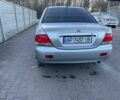Серый Мицубиси Лансер, объемом двигателя 1.6 л и пробегом 256 тыс. км за 4500 $, фото 2 на Automoto.ua