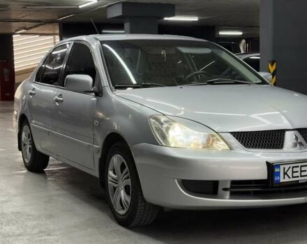 Серый Мицубиси Лансер, объемом двигателя 1.58 л и пробегом 271 тыс. км за 4200 $, фото 6 на Automoto.ua