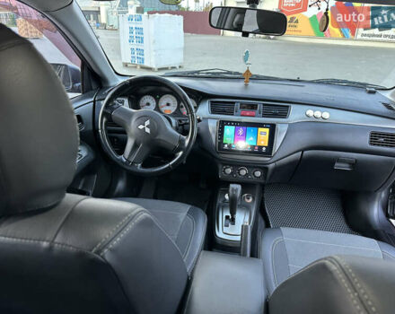 Сірий Міцубісі Lancer, об'ємом двигуна 1.6 л та пробігом 189 тис. км за 6200 $, фото 12 на Automoto.ua