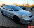 Сірий Міцубісі Lancer, об'ємом двигуна 1.6 л та пробігом 280 тис. км за 5000 $, фото 1 на Automoto.ua
