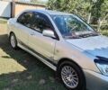 Сірий Міцубісі Lancer, об'ємом двигуна 1.6 л та пробігом 290 тис. км за 4600 $, фото 12 на Automoto.ua