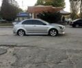 Сірий Міцубісі Lancer, об'ємом двигуна 2 л та пробігом 253 тис. км за 6724 $, фото 1 на Automoto.ua