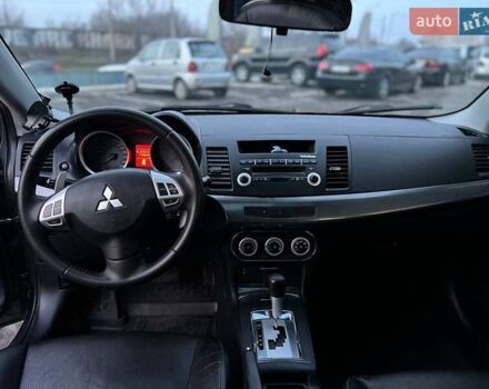 Серый Мицубиси Лансер, объемом двигателя 2 л и пробегом 170 тыс. км за 6999 $, фото 8 на Automoto.ua