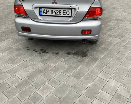 Серый Мицубиси Лансер, объемом двигателя 1.6 л и пробегом 263 тыс. км за 2350 $, фото 12 на Automoto.ua