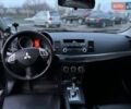 Серый Мицубиси Лансер, объемом двигателя 2 л и пробегом 170 тыс. км за 6999 $, фото 8 на Automoto.ua
