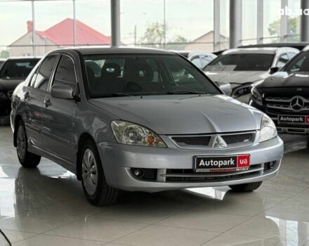 Серый Мицубиси Лансер, объемом двигателя 1.6 л и пробегом 174 тыс. км за 5990 $, фото 2 на Automoto.ua