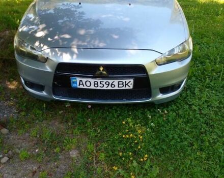 Серый Мицубиси Лансер, объемом двигателя 2 л и пробегом 160 тыс. км за 5300 $, фото 2 на Automoto.ua