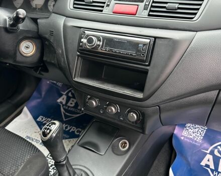 Серый Мицубиси Лансер, объемом двигателя 1.6 л и пробегом 280 тыс. км за 4600 $, фото 6 на Automoto.ua