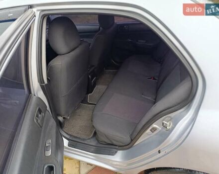 Серый Мицубиси Лансер, объемом двигателя 1.6 л и пробегом 268 тыс. км за 2900 $, фото 4 на Automoto.ua