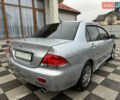 Сірий Міцубісі Lancer, об'ємом двигуна 1.6 л та пробігом 281 тис. км за 3999 $, фото 9 на Automoto.ua