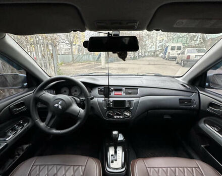 Серый Мицубиси Лансер, объемом двигателя 1.6 л и пробегом 238 тыс. км за 4400 $, фото 17 на Automoto.ua