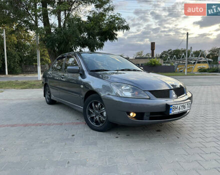 Сірий Міцубісі Lancer, об'ємом двигуна 1.6 л та пробігом 189 тис. км за 6200 $, фото 6 на Automoto.ua
