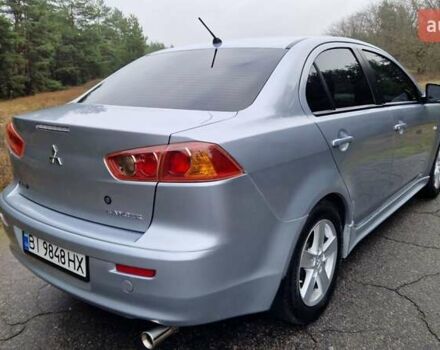 Серый Мицубиси Лансер, объемом двигателя 2 л и пробегом 213 тыс. км за 6550 $, фото 7 на Automoto.ua