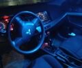 Серый Мицубиси Лансер, объемом двигателя 1.5 л и пробегом 215 тыс. км за 4999 $, фото 3 на Automoto.ua