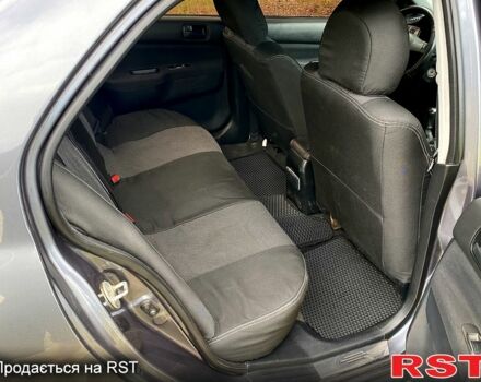 Серый Мицубиси Лансер, объемом двигателя 1.6 л и пробегом 212 тыс. км за 4600 $, фото 11 на Automoto.ua